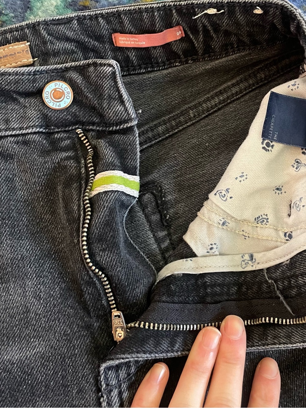 Pilcro & The Letterpress black "The Cigarette" jeans w/ raw hem